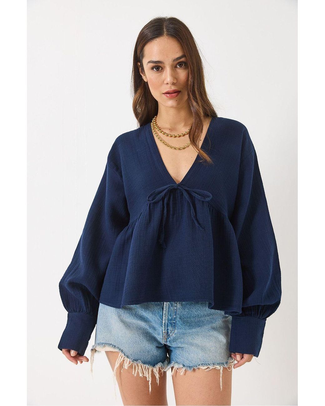 Bianco Lucci Blue Textured V-Neck Crop Blouse With Bow Tie