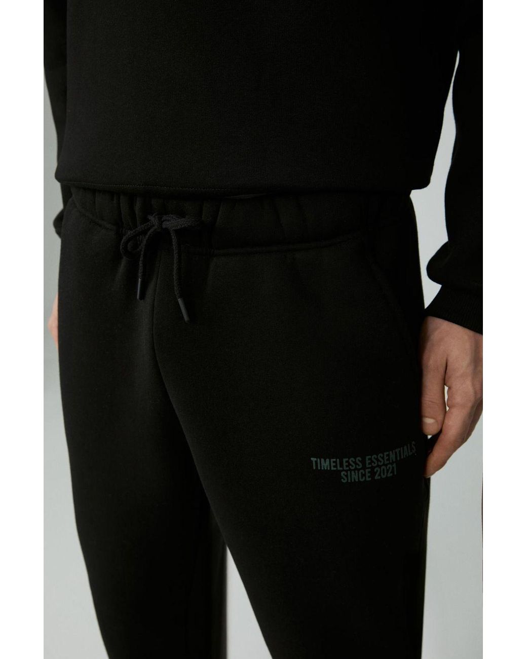 Grimelange Elastische Joggingbroek Met Tekstprint in het Black voor heren