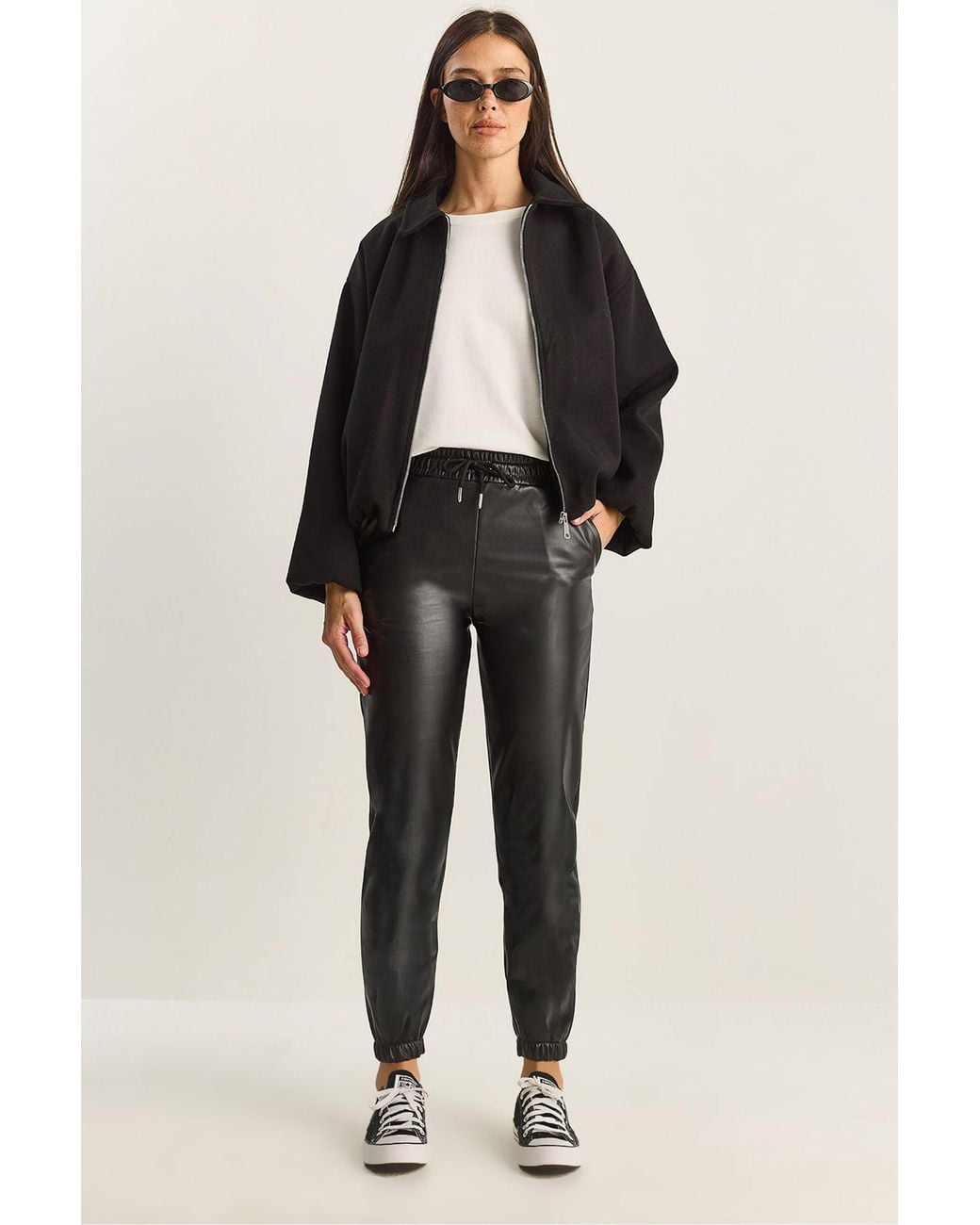 Bianco Lucci Black Faux Leather Jogger Pants With Tie Closure