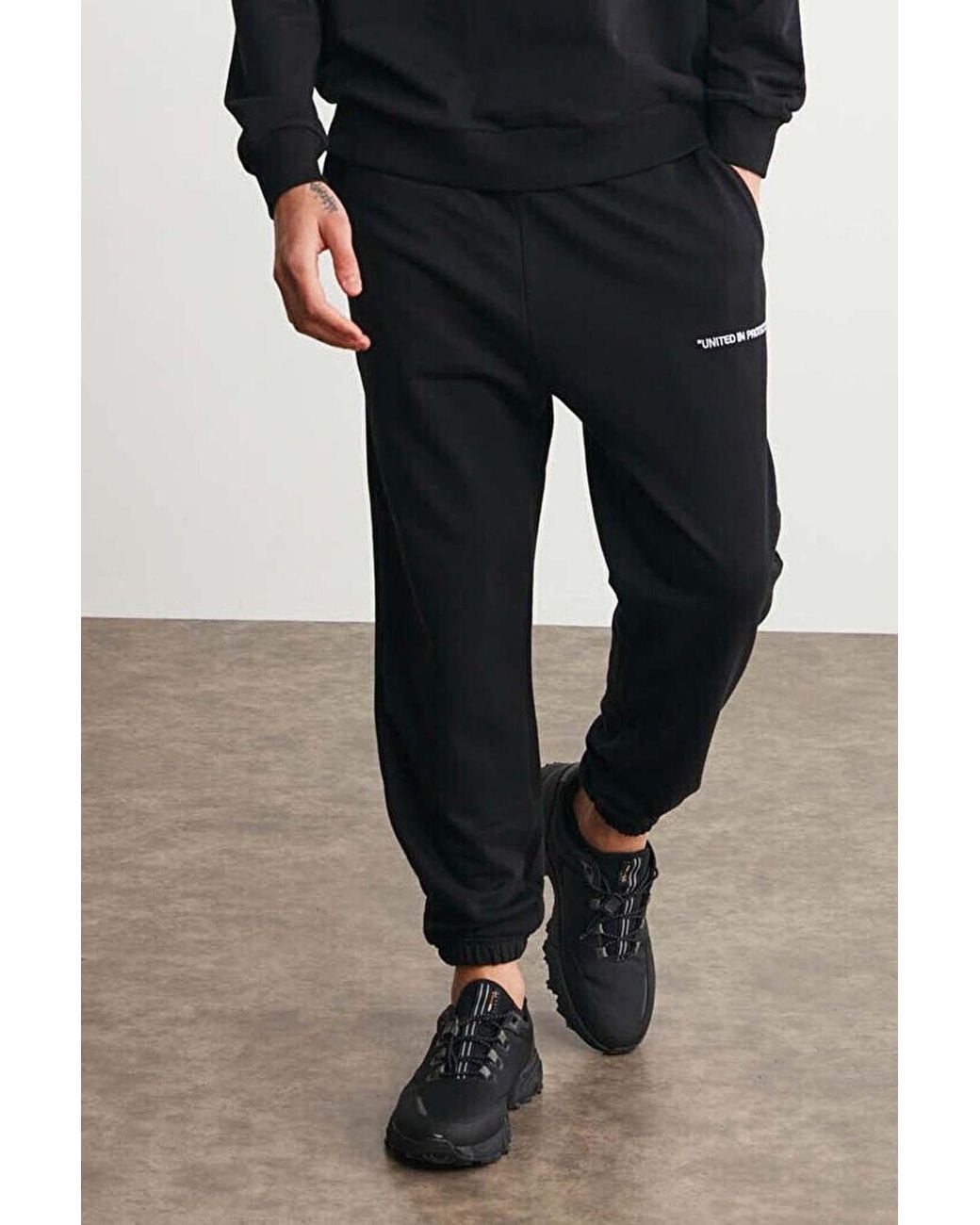 Grimelange Black Elastic Waist Long Joggers for men