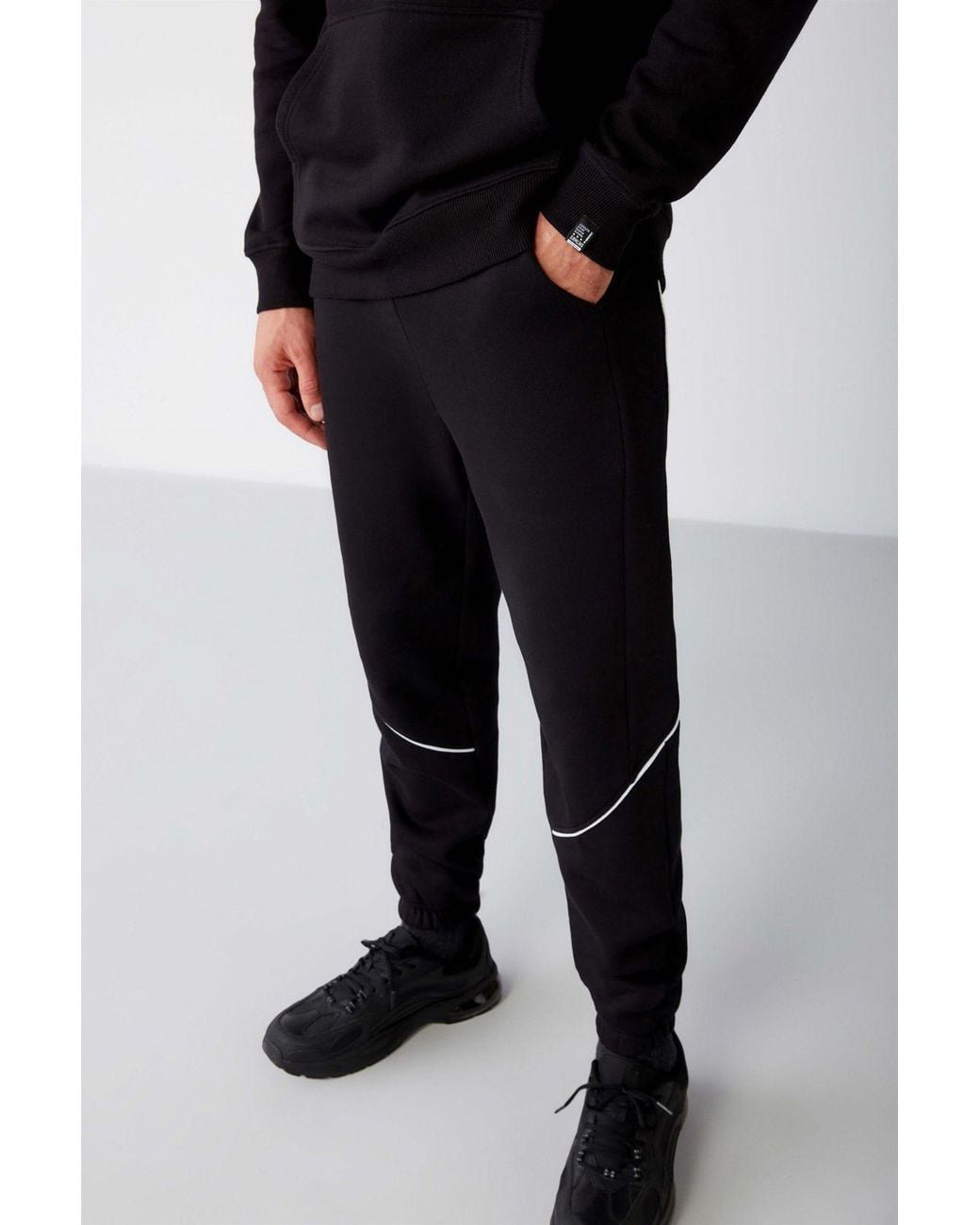 Grimelange Black Relaxed Tapered Joggers for men