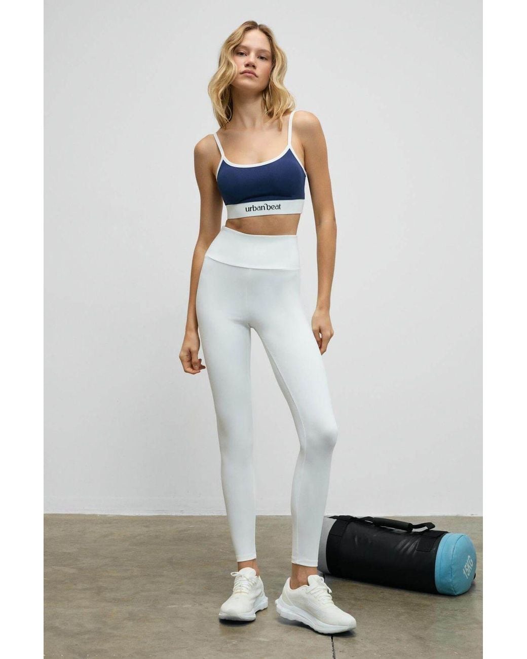 Grimelange White Super High Waist Skinny Leggings