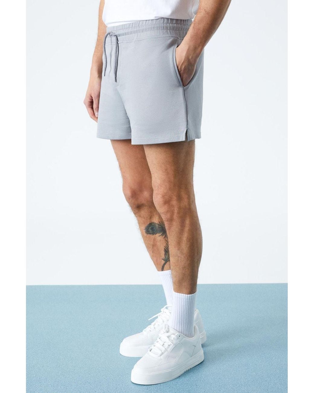 Grimelange Blue Straight Leg Jersey Shorts for men