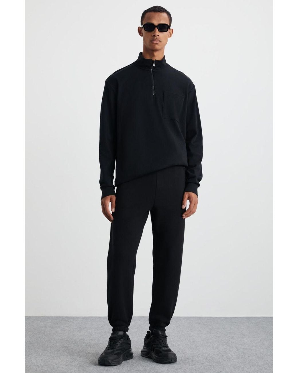 Grimelange Black Relaxed Elastic Waist Joggers for men