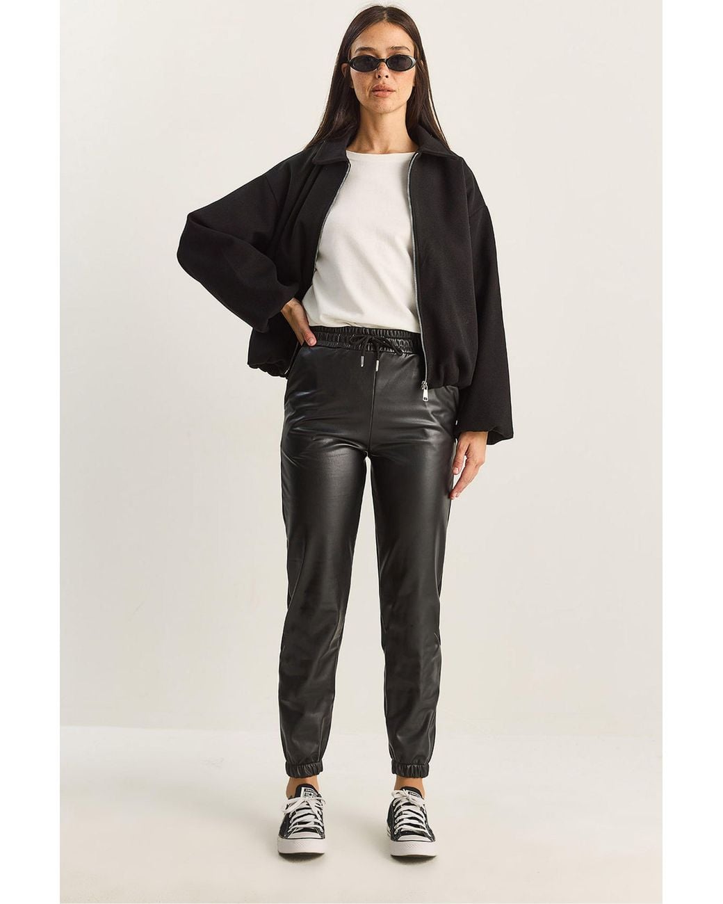 Bianco Lucci Black Faux Leather Jogger Pants With Tie Closure