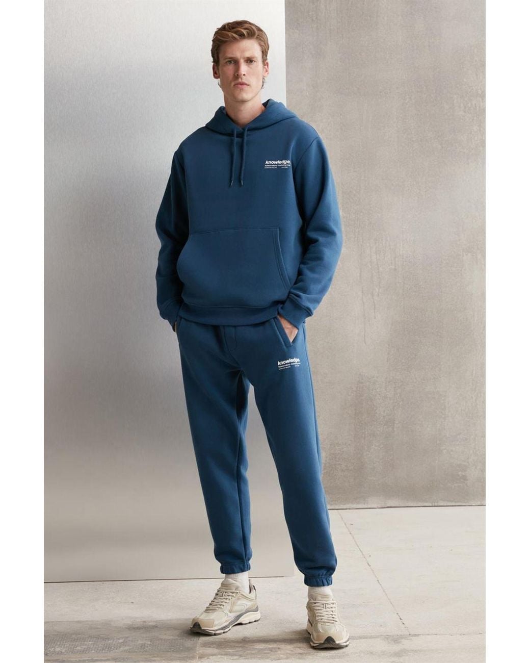 Grimelange Blue Tapered Joggers With Pockets for men