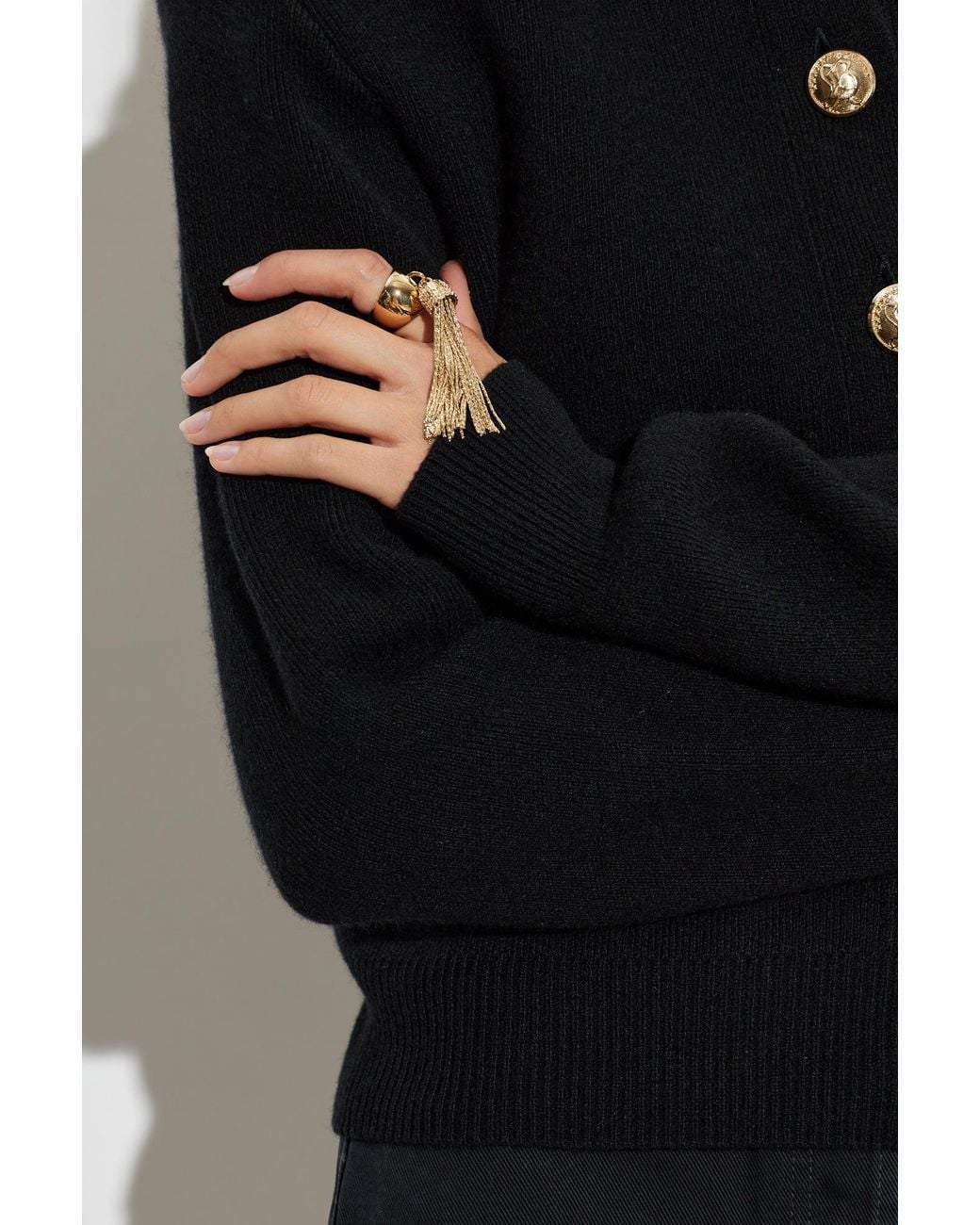 Balmain Metallic Brass Ring With A Dangling Charm