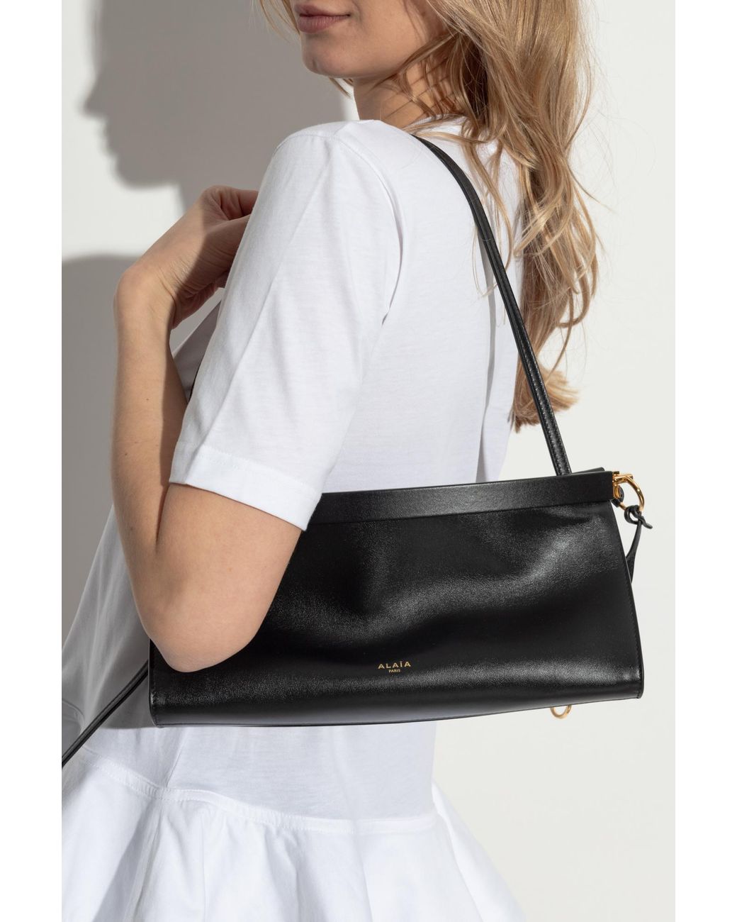 Alaïa Shoulder Bag 'Le Click East West Medium' in Black | Lyst