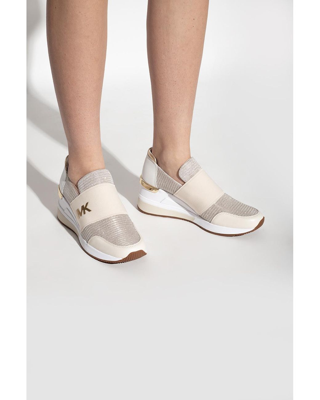 michael kors felix wedge sneakers