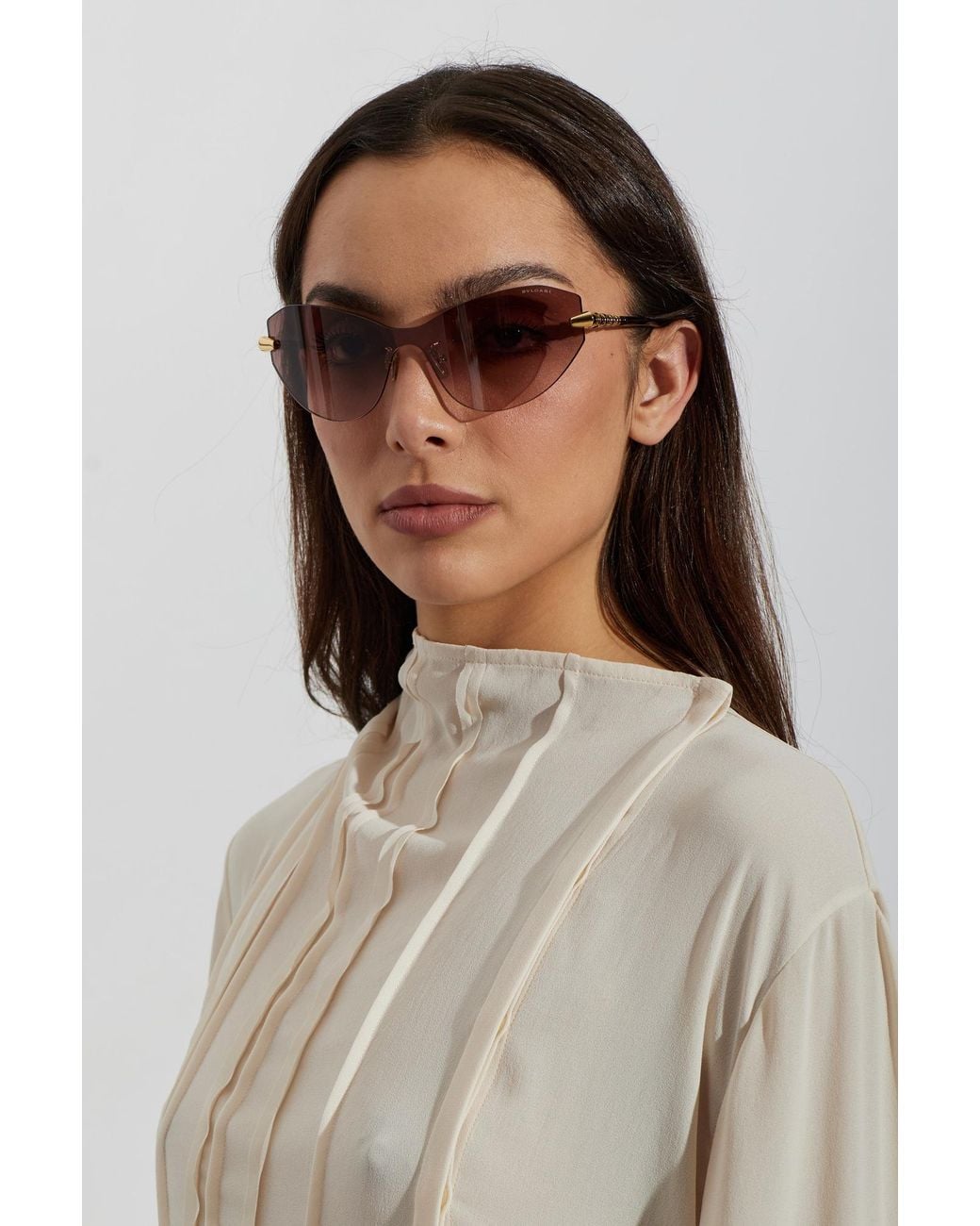 BVLGARI Pink Sunglasses With A Lightweight Rimless Design And Cat-Eye Lenses