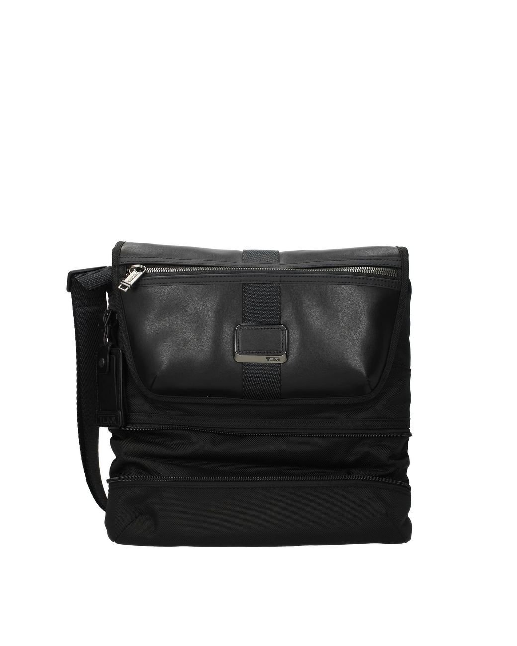 Tumi travis top