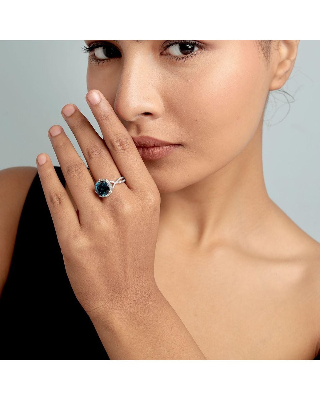 Artisan Blue London Topaz & Diamond Halo Ring