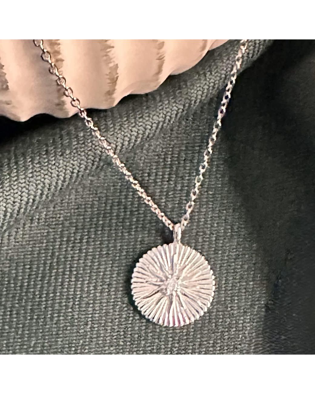 Clemence Wren Metallic Radiant Star Pendant Necklace