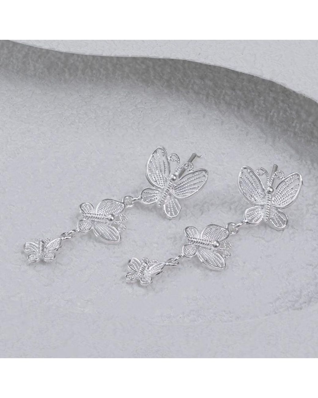 Far East Jewelry White Handcrafted Butterfly Shadow Earrings
