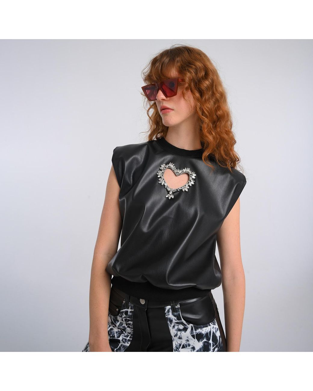 Lalipop Design Black Vegan Leather Blouse With Faux Crystal Embellished Laser Cut-Out Heart