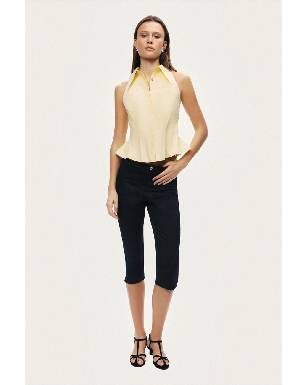 Nocturne White Sleeveless Sculpted Shirt