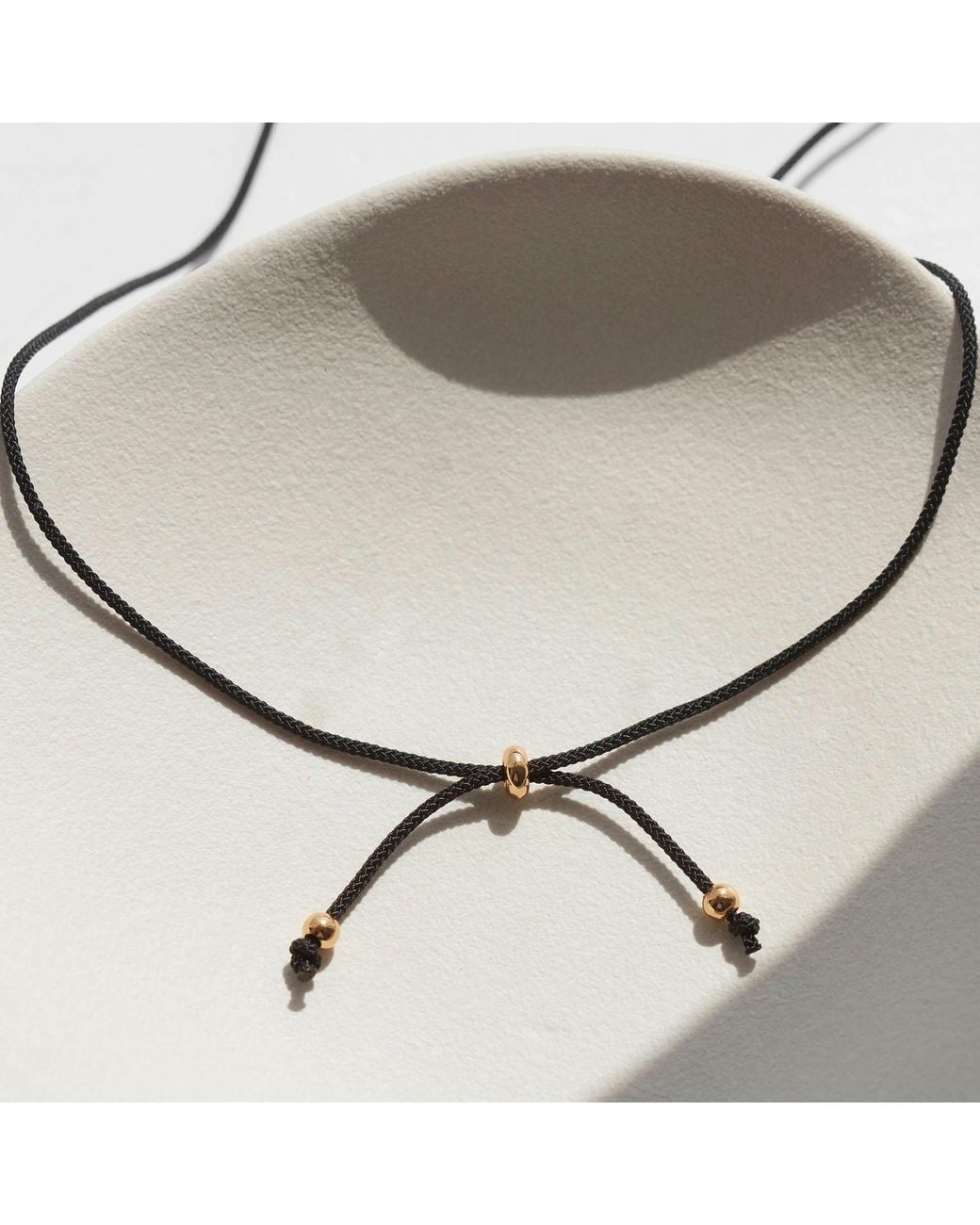 Muru Metallic Karma Circle Cord Necklace