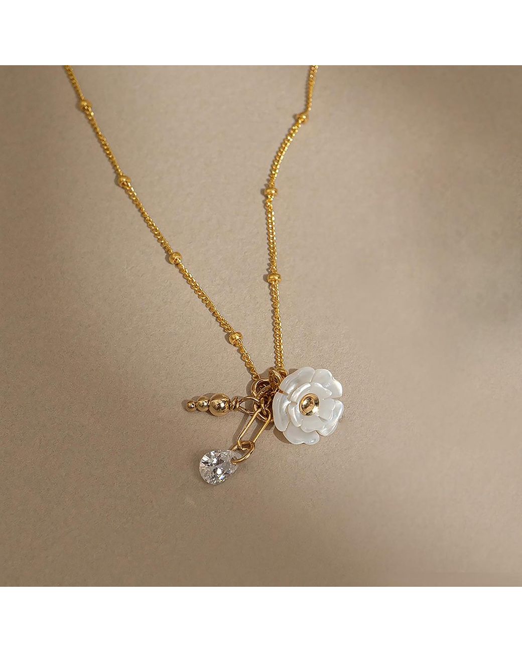 Kate Koel Metallic Pearl Flower Charm Necklace