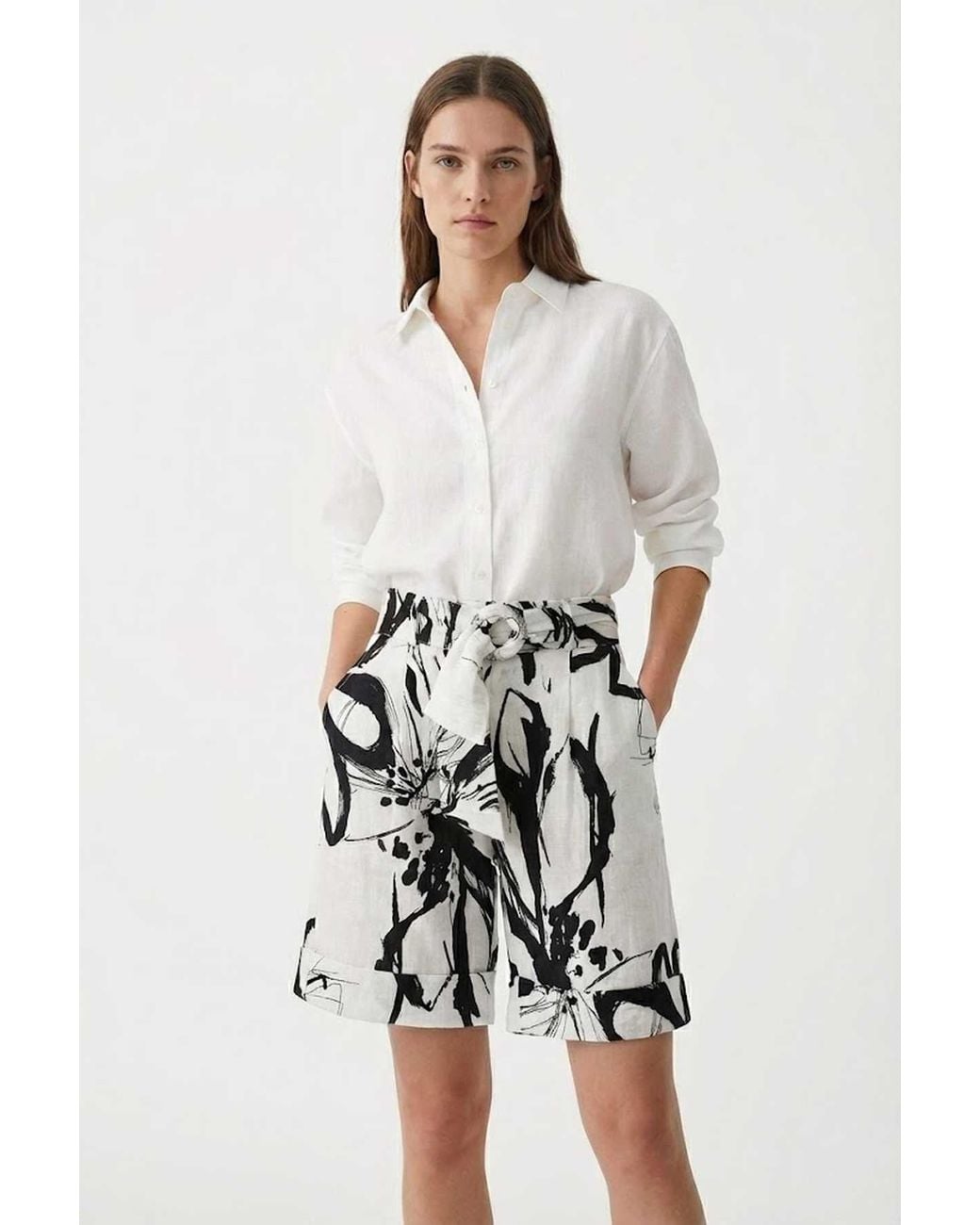 Conquista White High-Waisted Abstract Print Linen Shorts With Matching Belt