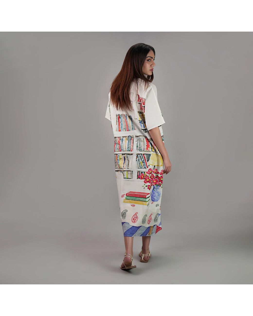DHARA SHETH DUBAI White Abode Artistic Bookshelf Printed Kaftan Maxi Dress