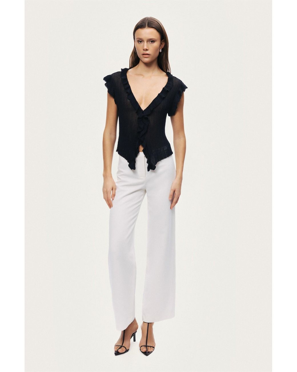 Nocturne Black Ruffled V-Neck Sheer Blouse