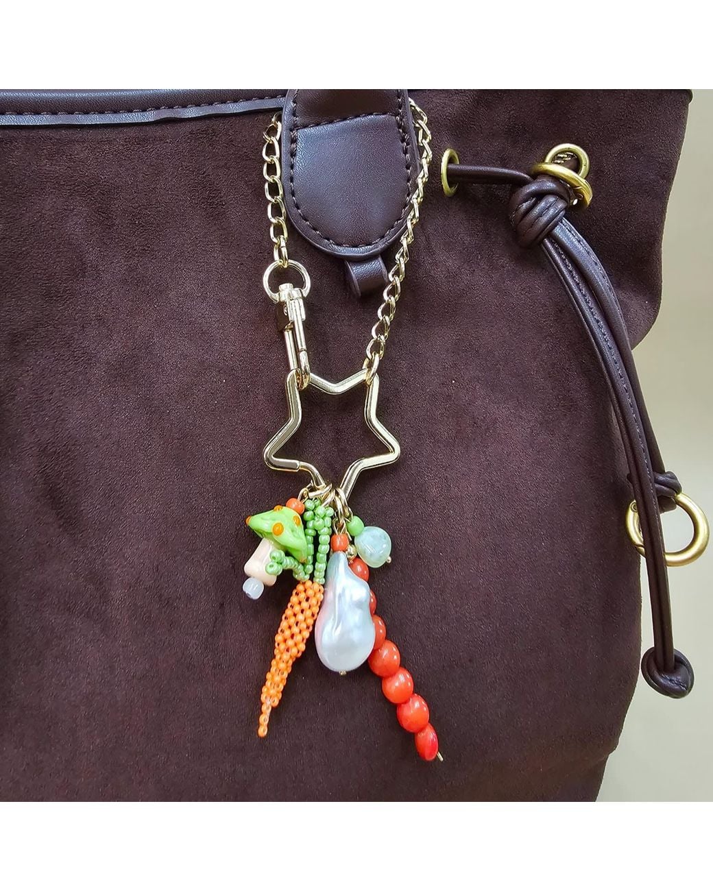 Farra Metallic Baroque Pearl Bamboo Coral And Handcrafted Carrot Bag Charm