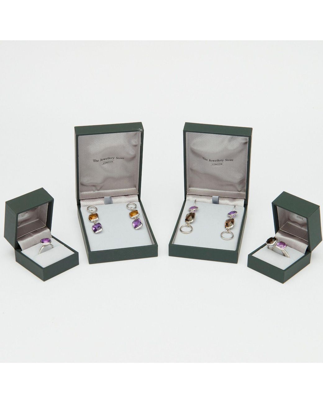 The Jewellery Store London Metallic Mystic Passion Ring. With Ruby