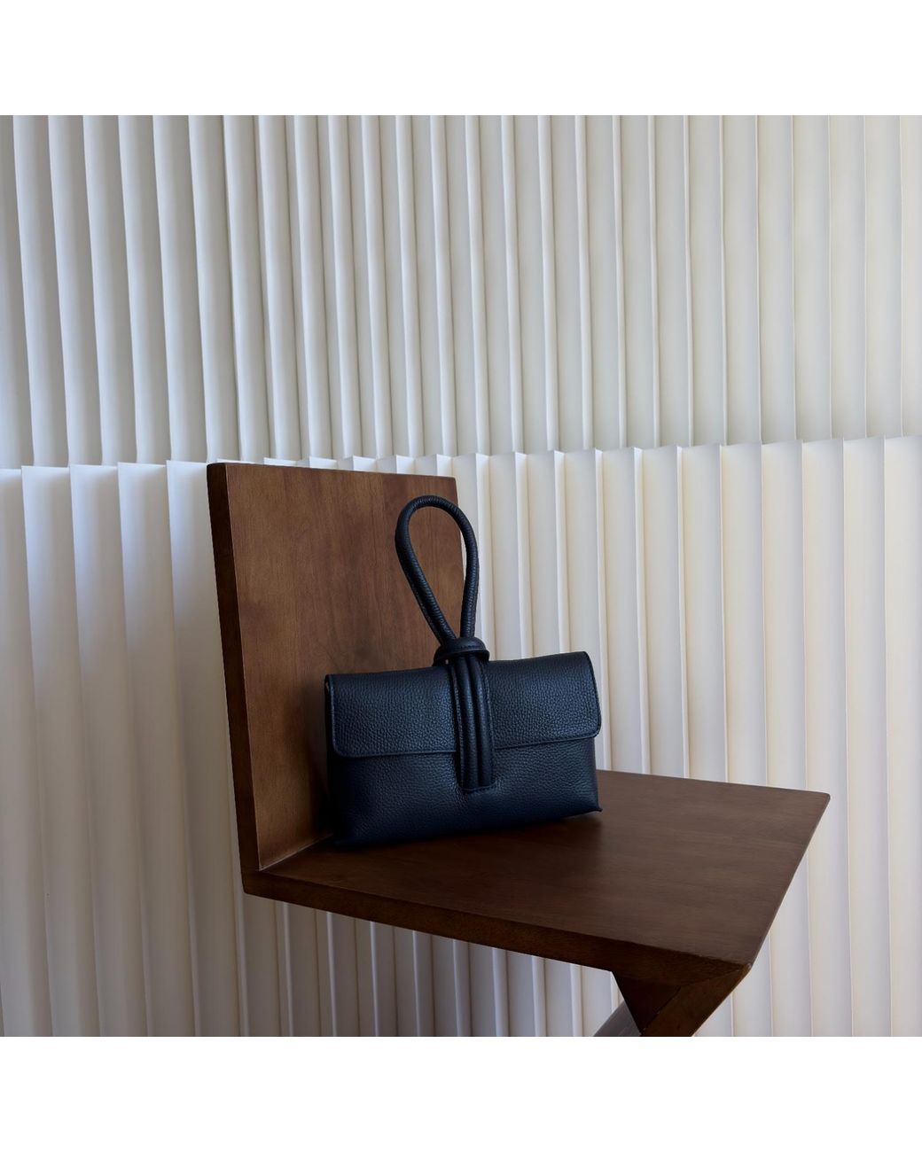 London Atelier Byproduct Blue Leather Loop Clutch Bag