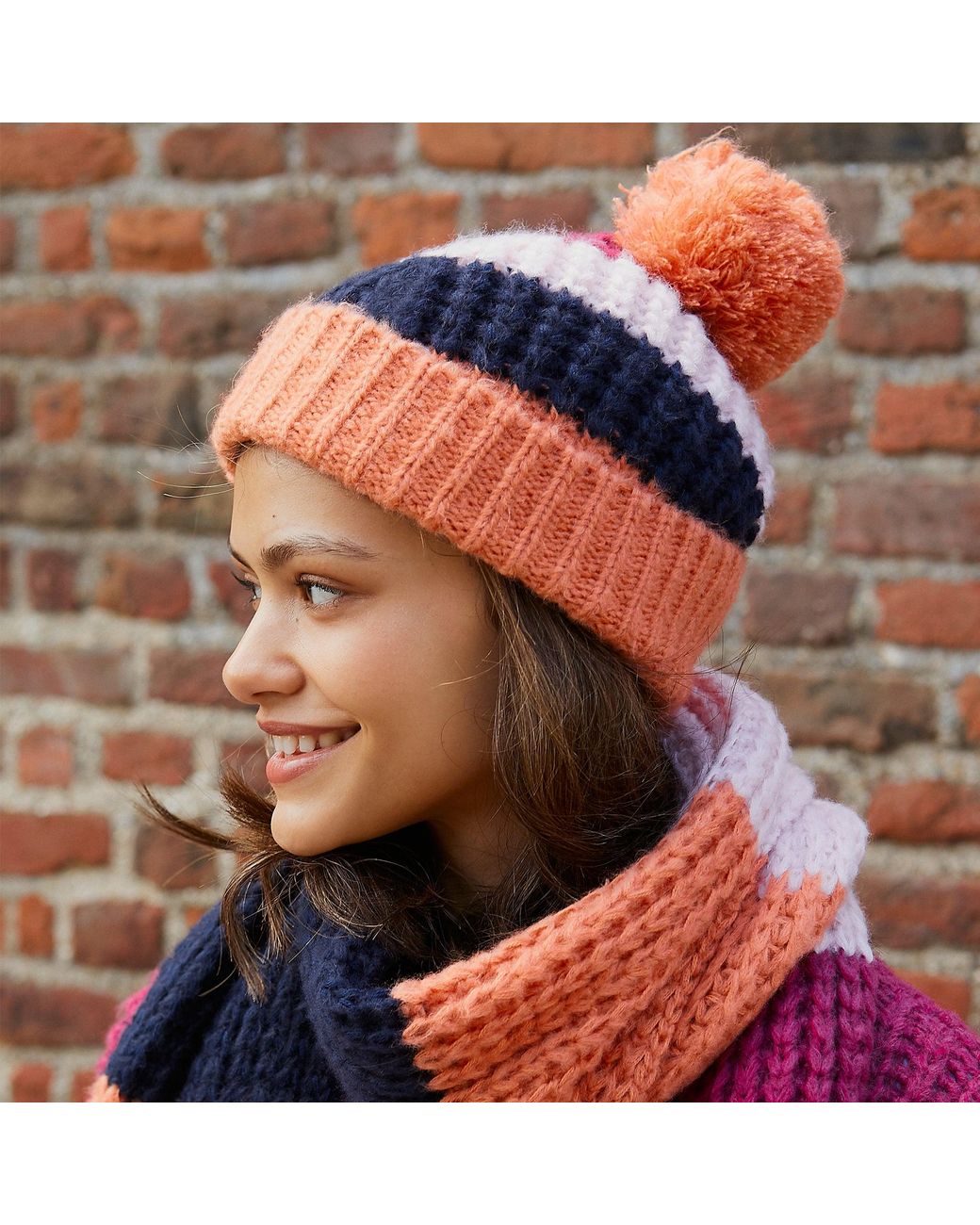 Cara & The Sky Orange Phoebe Stripe Beanie Bobble Hat