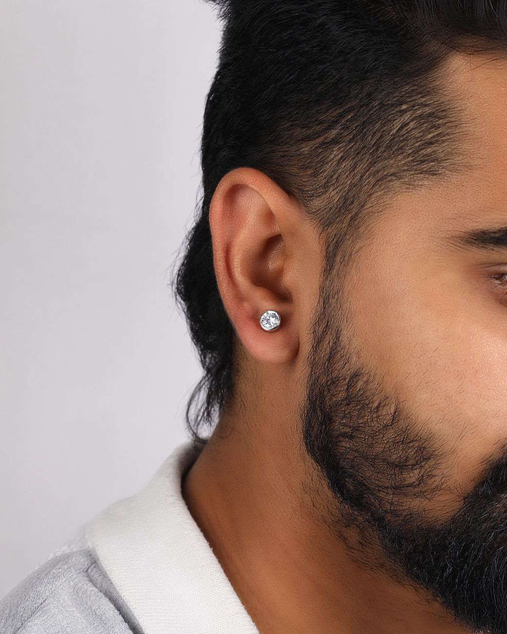 The Jewelz Metallic Round Solitaire Cz Stud Earrings for men
