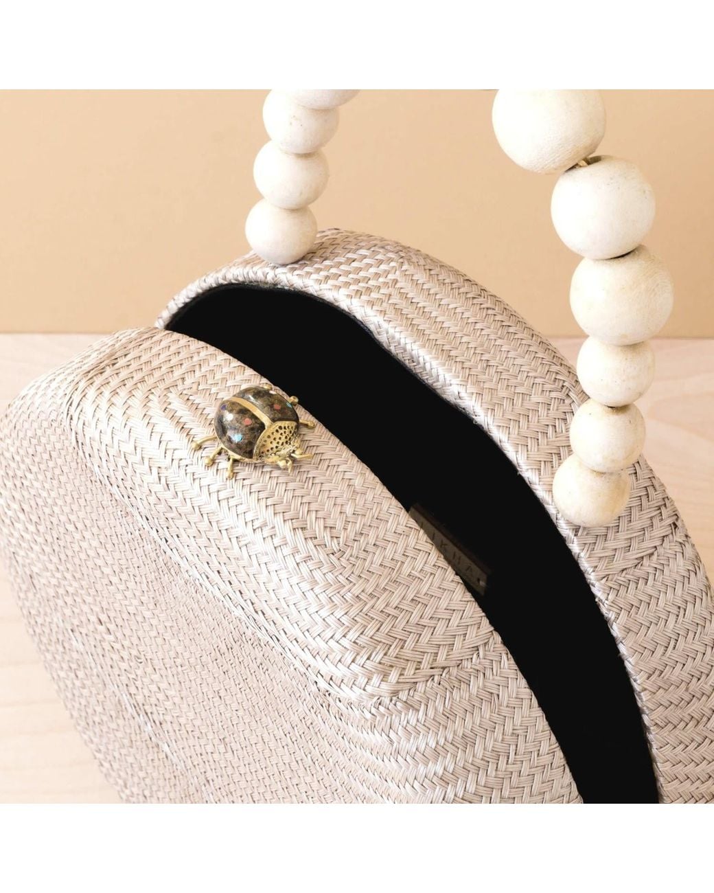 LIKHÂ Natural Neutrals Dusty Rose Round Classic Handbag With Wood Bead Handle