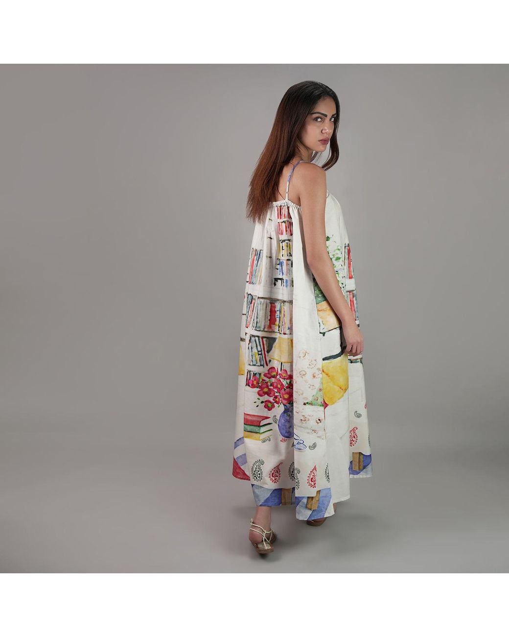 DHARA SHETH DUBAI White Abode Artistic Bookshelf Printed Spaghetti Strap Maxi Dress