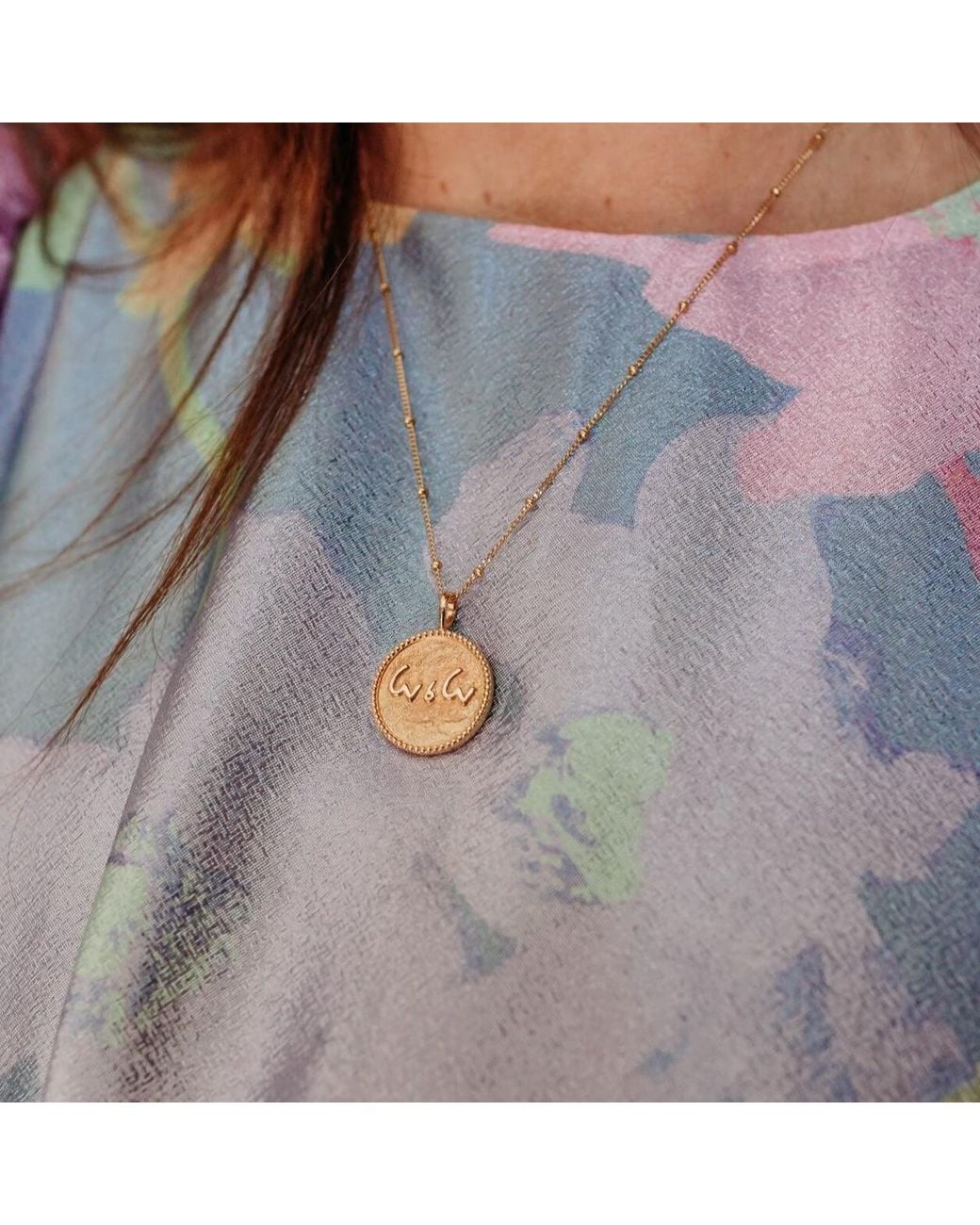Claire Hill Designs Metallic Love Is Love Coin Necklace