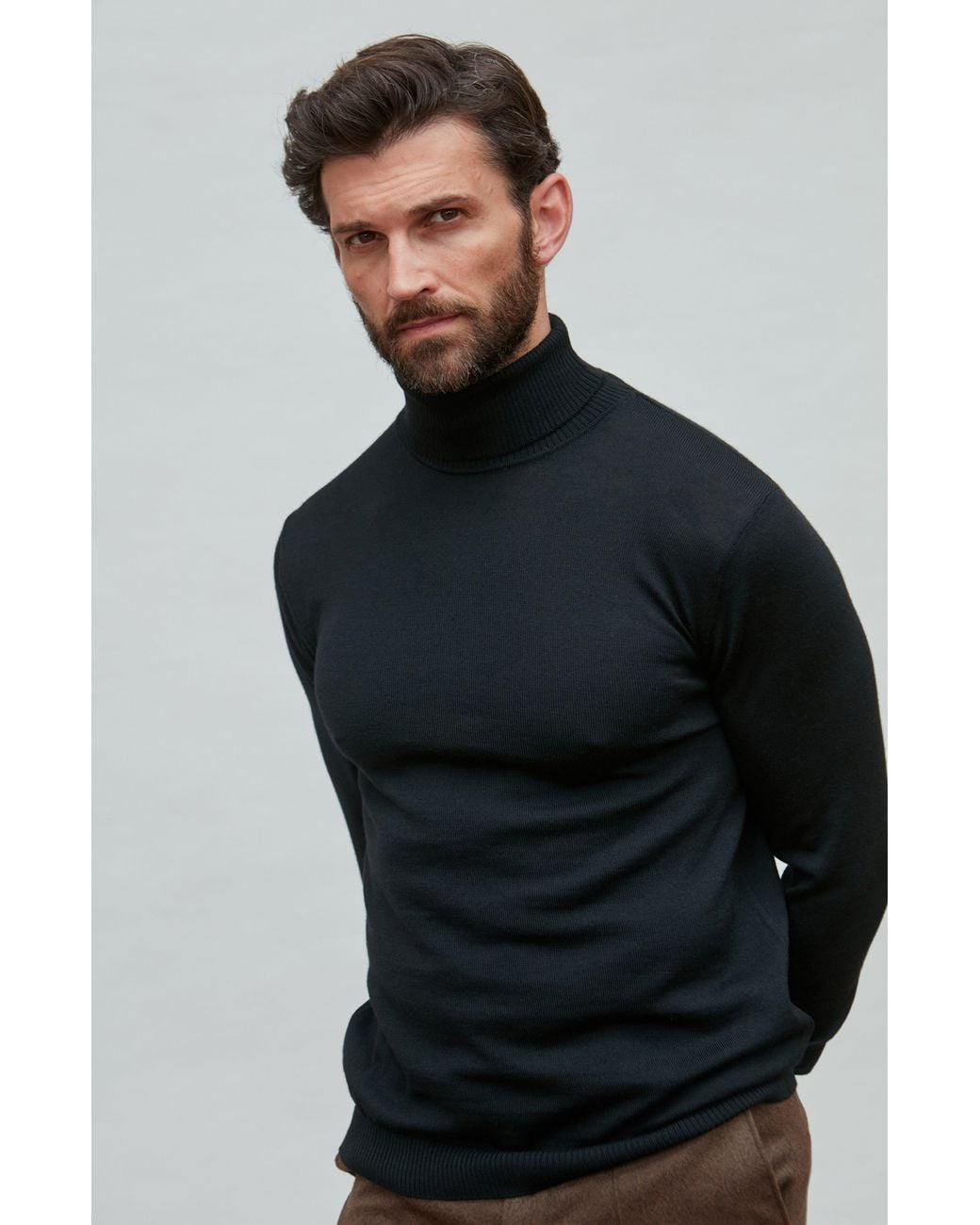 Paul James Knitwear Black Extra Fine Merino Wool Westonn Roll Neck Jumper for men