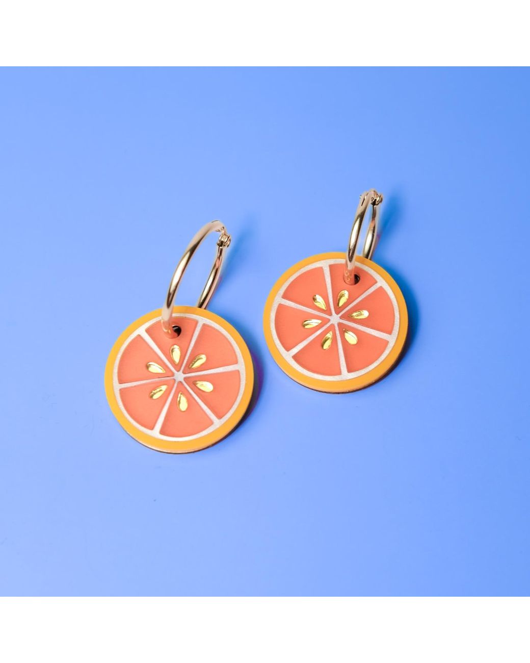 By Chavelli Orange Blood Dangly Hoop Earrings
