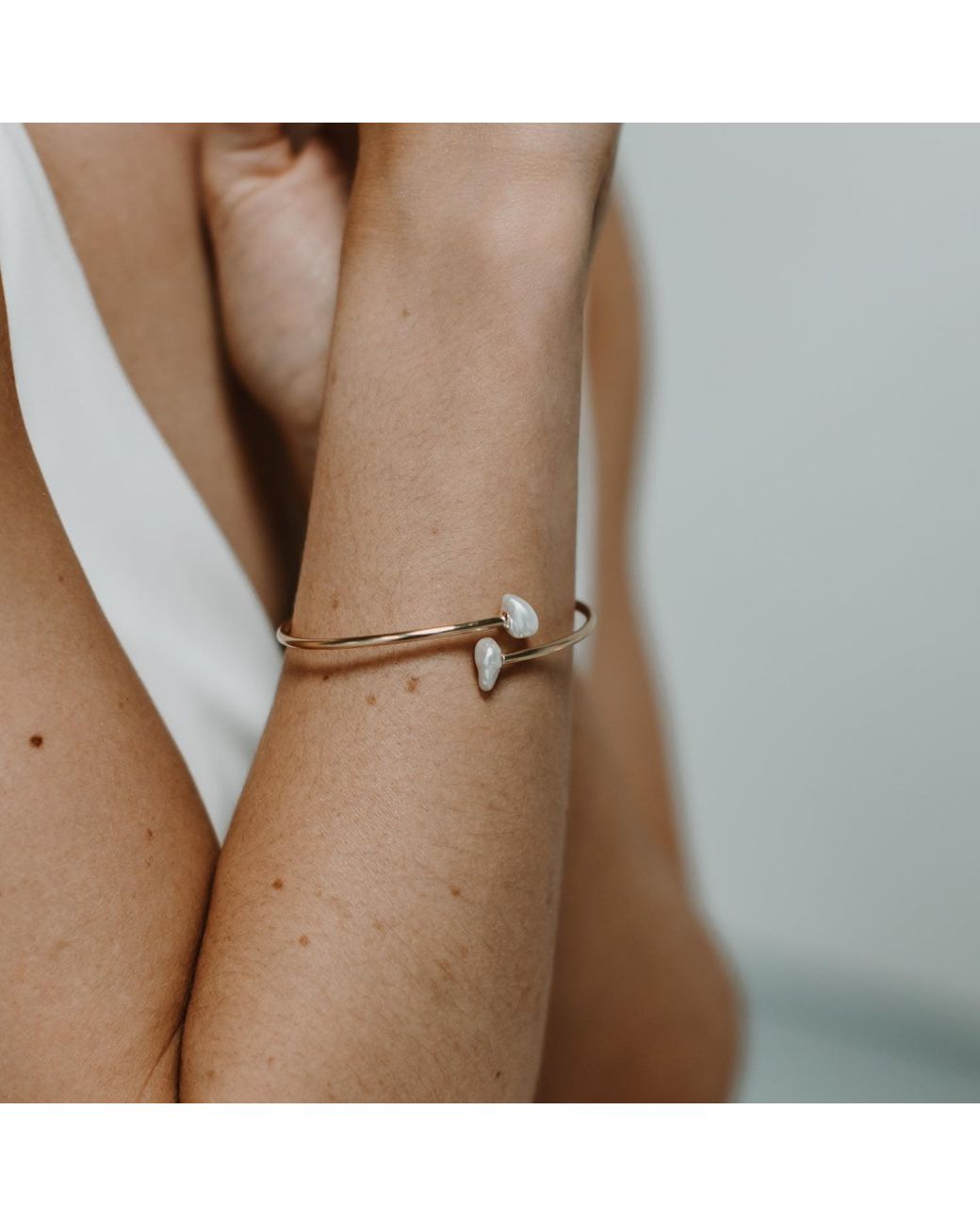 Kiri & Belle White Tori Flexible Pearl Filled Bangle