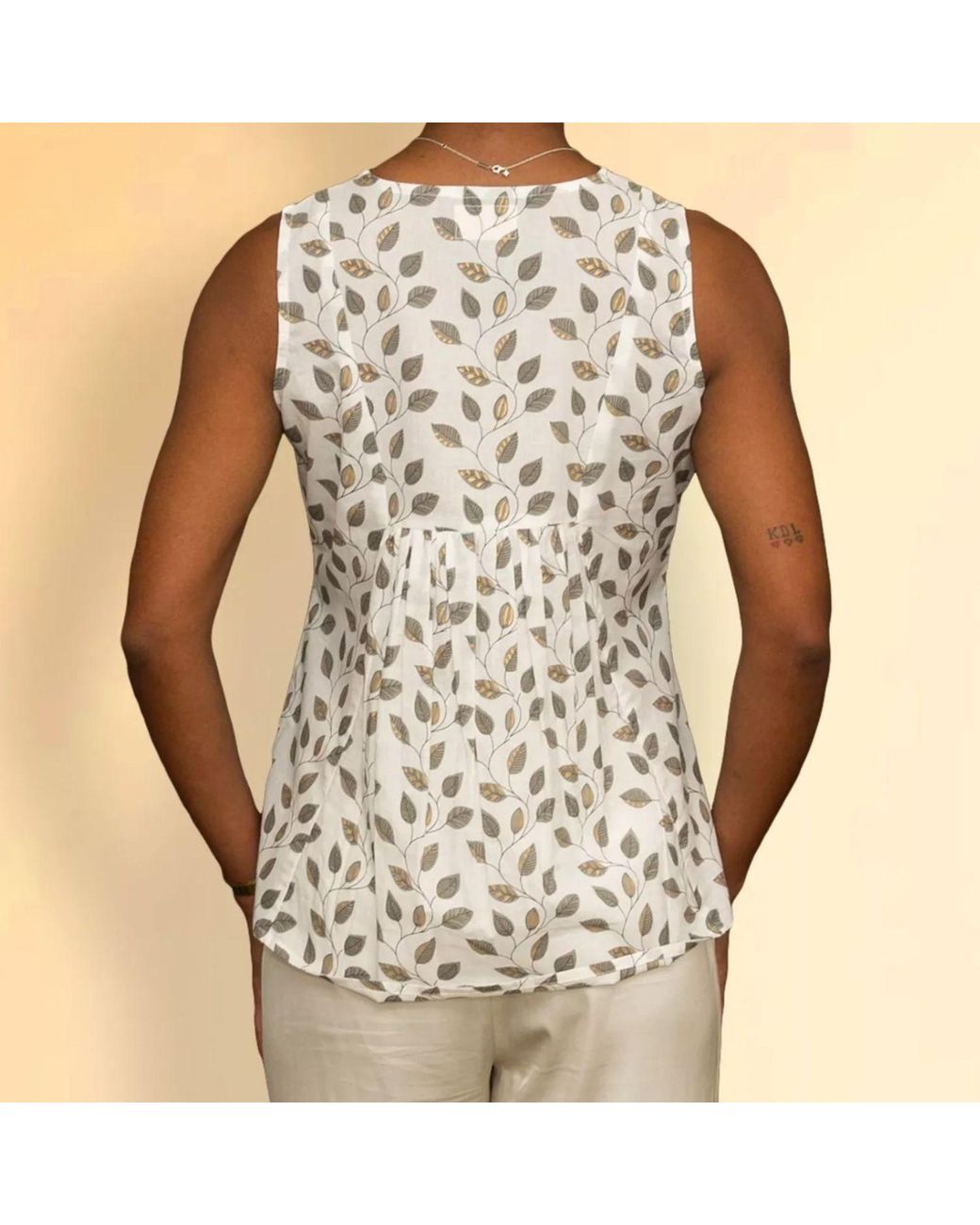 House of Gl Natural Neutrals Nira Cotton Sleeveless V-Neck Blouse With Leaf Print