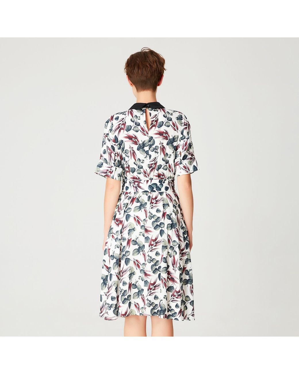 Smart and Joy White Fit-And-Flare Leaves Print Dress With Wide Belt