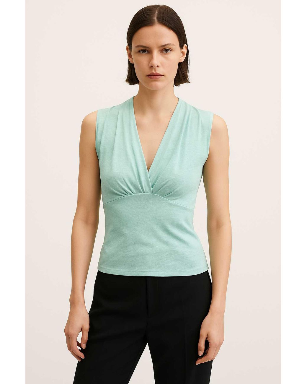Conquista Green Deep V-Neck Sleeveless Top