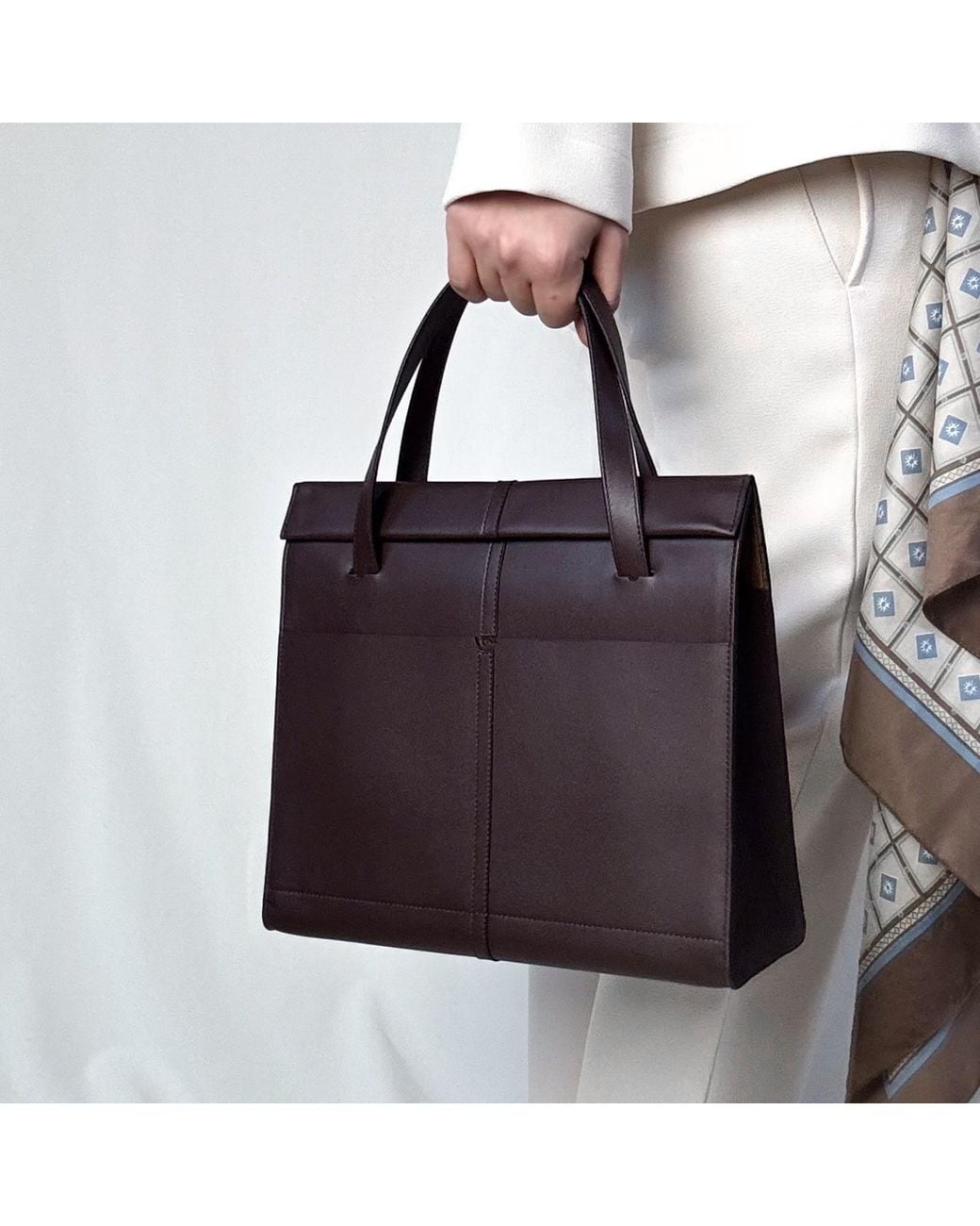 godi. Black The Roon Top Handle Leather Bag