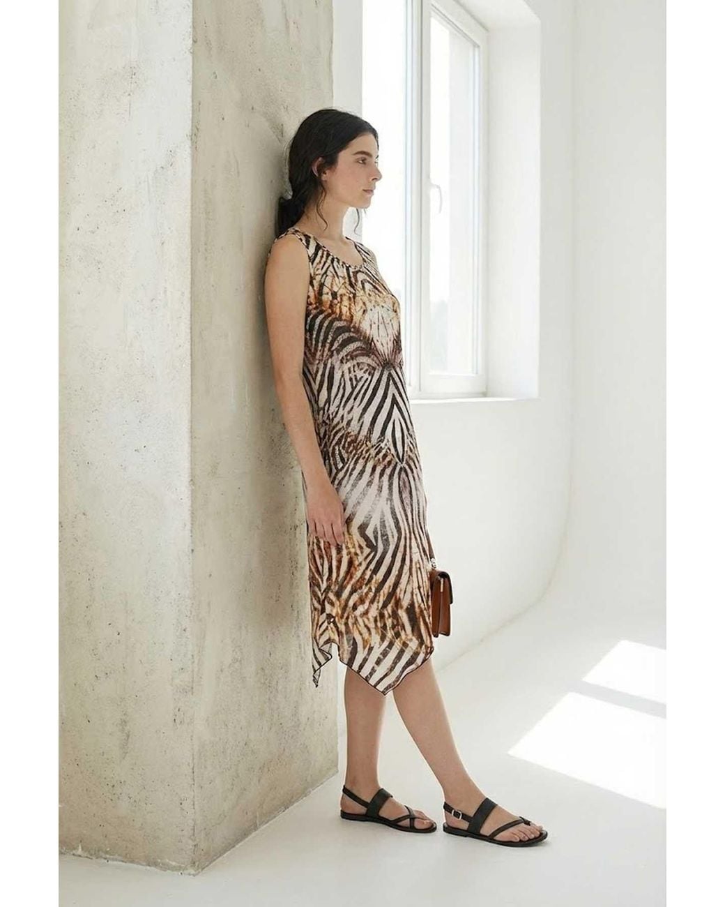 Conquista White Sleeveless Asymmetric Midi Dress With Zebra-Inspired Abstract Print