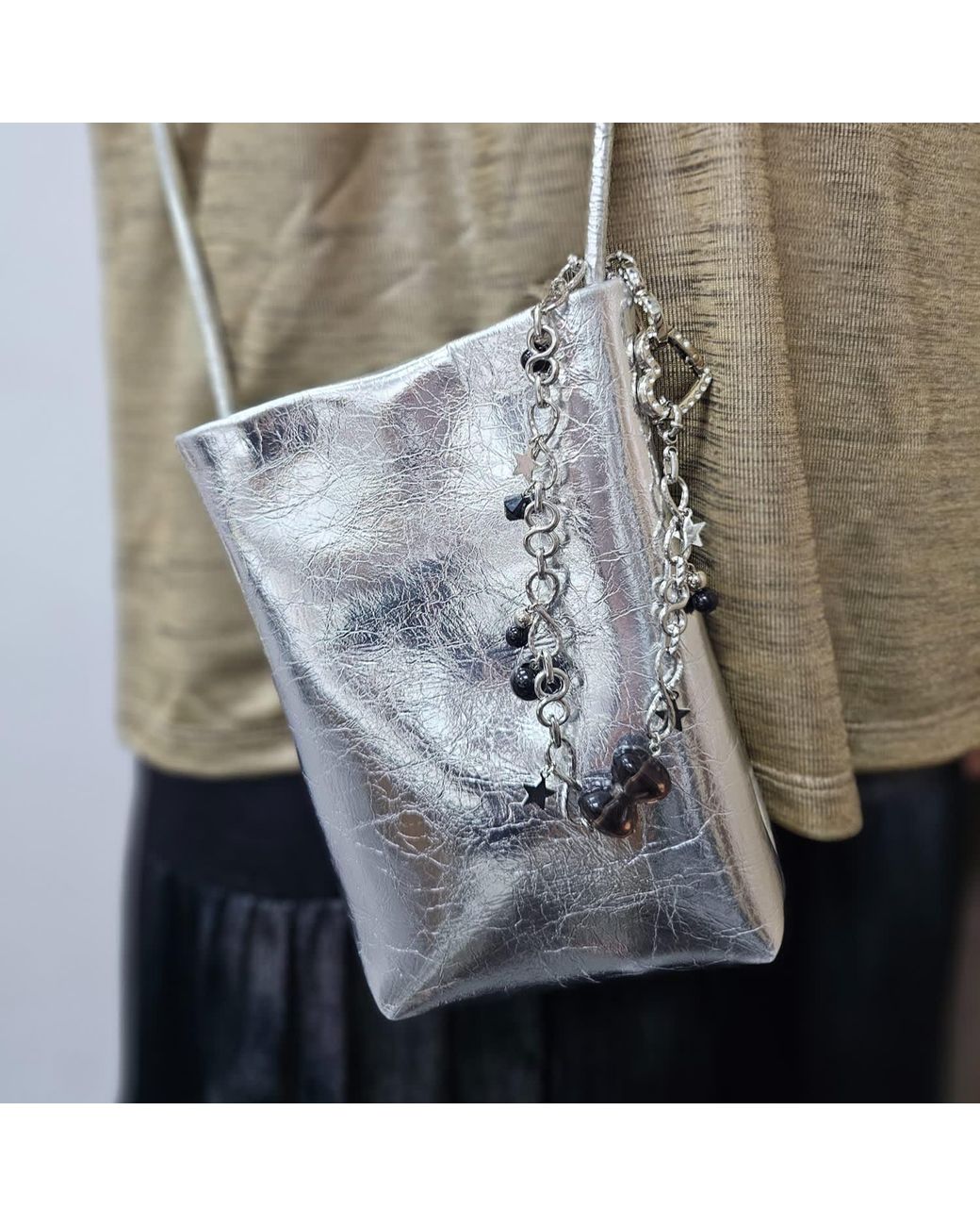 Farra Metallic Smoky Quartz Bowknot With Obsidian Chain Bag Charm