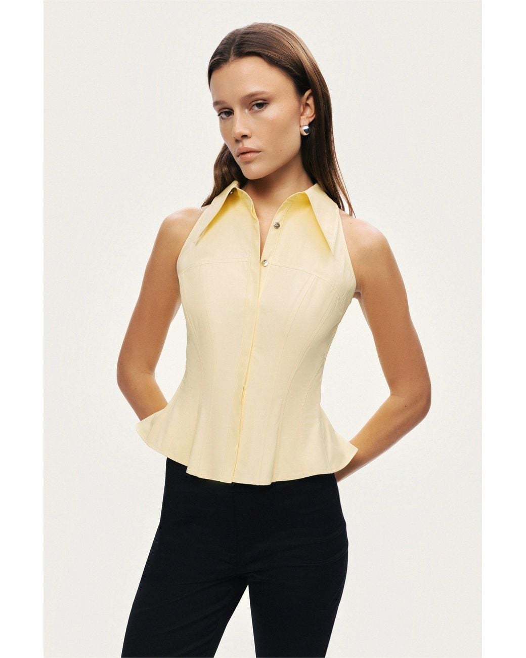 Nocturne White Sleeveless Sculpted Shirt