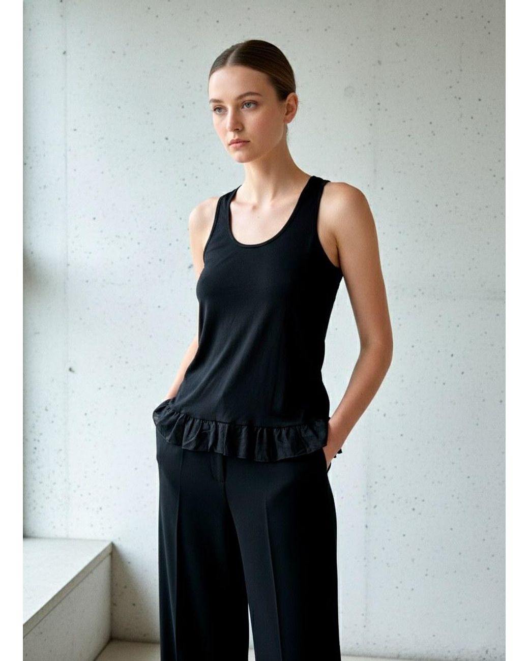 Conquista Black Racerback Tank Top With Ruffle Hem