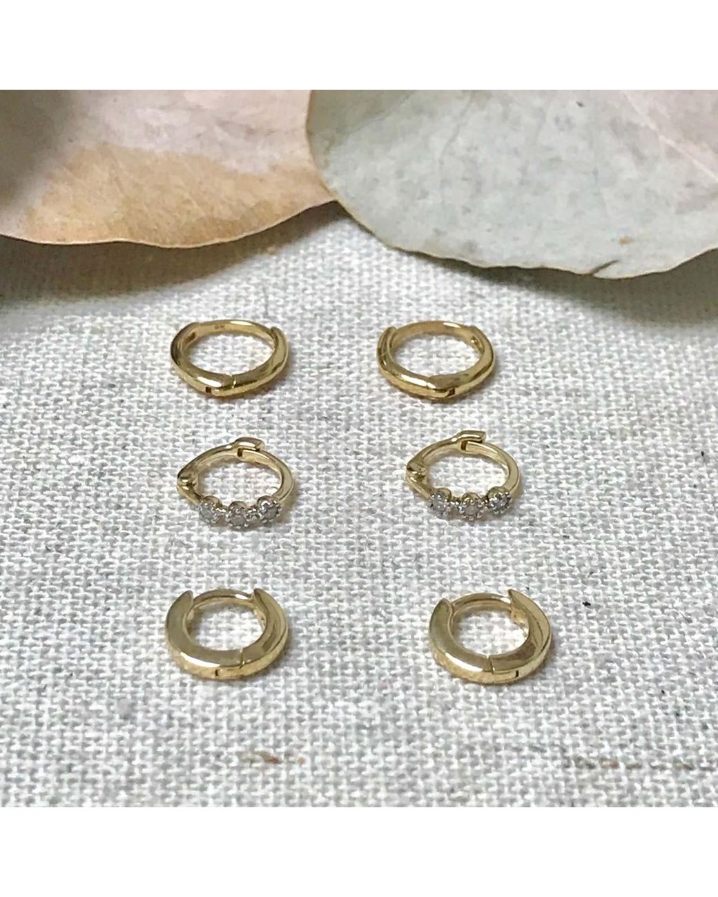Zohreh White Teeny Wide Huggie Hoop Earring 9K