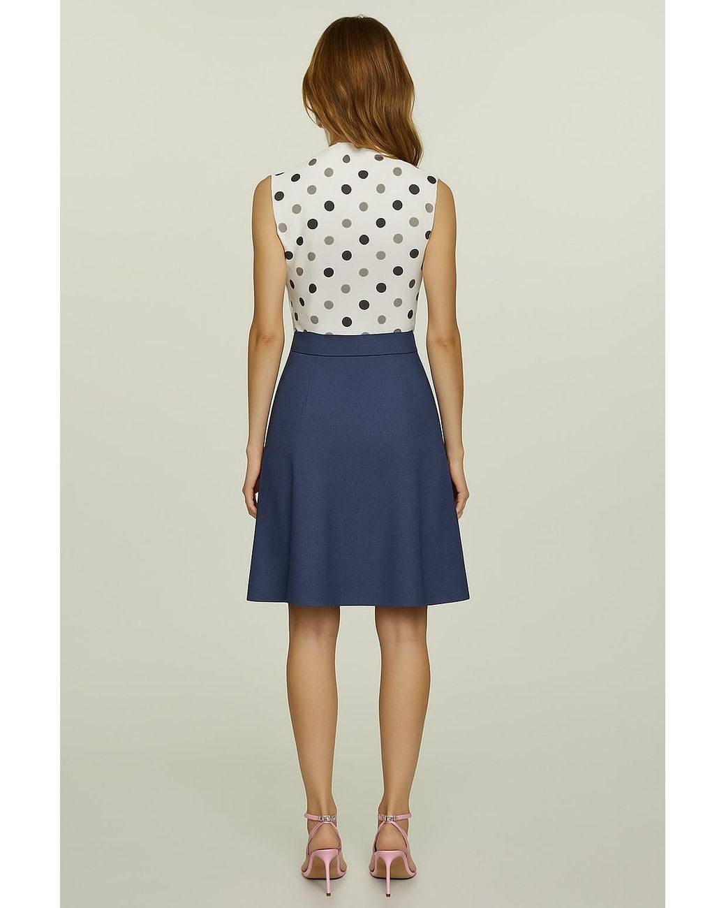 Conquista White Sleeveless Polka Dot Jersey Top