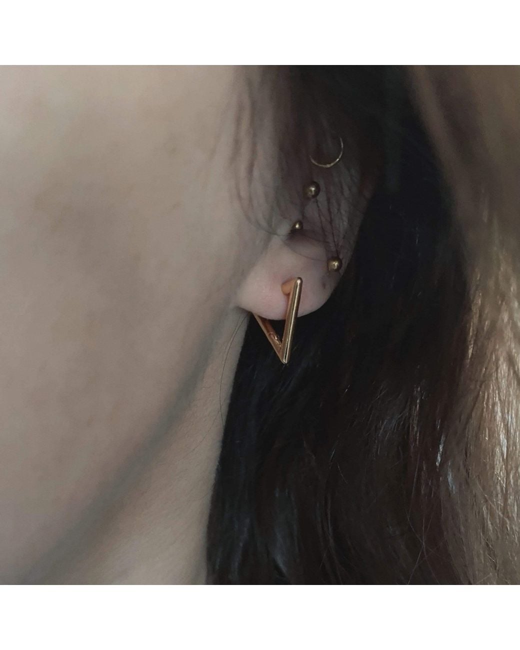 IN CAUDA VENENUM Metallic Delta Earrings