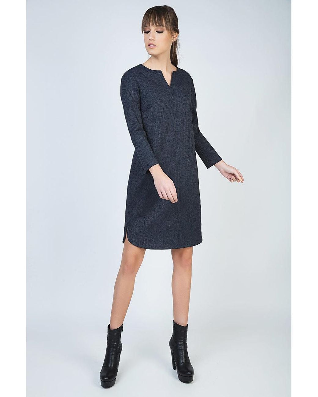 Conquista Black Long Sleeve Dress With Rounded Hemline