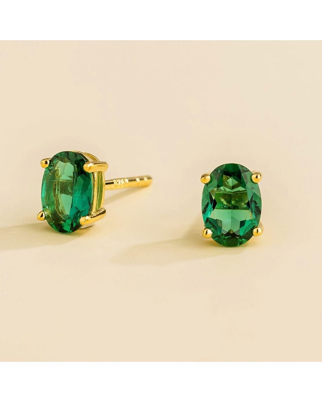Juvetti Green Ova Gold Earrings Set With Emerald