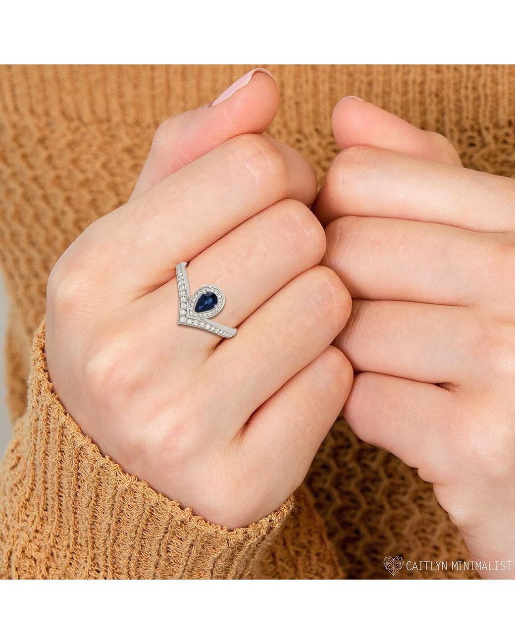 Artisan Metallic Pear Cut Sapphire Diamond V Ring